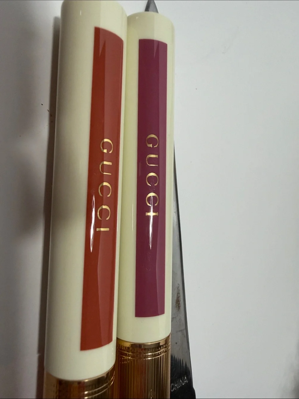 2 Gucci Liquid Lip Colors in Plum & Brick 217 & 225
